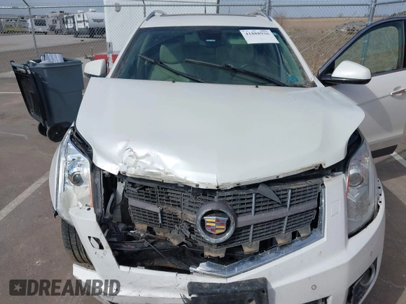 2012 Cadillac SRX Premium Collection с VIN 3GYFNFE37CS652140, выставлен на аукционе IAAI как лот 41888936 с пробегом Не указан миль и . История ставок и продаж доступна на DreamBid. Изображение 10.
