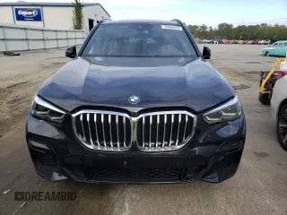 2022 BMW X5 xDrive40i with VIN 5UXCR6C05N9M87988, listed as a Copart auction lot 70896652 with 571 mi miles. Bid and sale history available at carsss.com. Image 5.