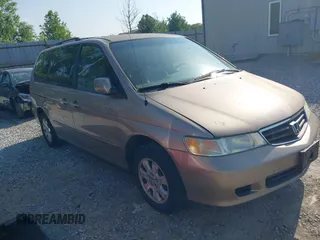 2003 Honda Odyssey EX-L z VIN 5FNRL18993B017733, wystawiony jako IAAI lot #42293386 z przebiegiem 86 659 mil mil oraz . Historia ofert i sprzedaży dostępna na DreamBid. Obrazek 1.