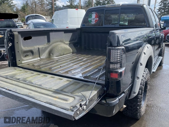 2005 Ford F-150 STX with VIN 1FTRX14W15NB53391, listed as a Copart auction lot 50452905 with 169,403 mi miles and Salvage Title. Bid and sale history available at carsss.com. Image 4.