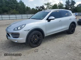 2014 Porsche Cayenne с VIN WP1AA2A21ELA06309, выставлен на аукционе Copart как лот 61532195 с пробегом 85 586 миль миль и Чистый • Clean title. История ставок и продаж доступна на DreamBid. Изображение 1.