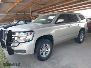 2016 Chevrolet Tahoe LS with VIN 1GNSKAKC4GR166406, listed as a IAAI auction lot 41949187 with 114,519 mi miles. Bid and sale history available at carsss.com. Image 2.