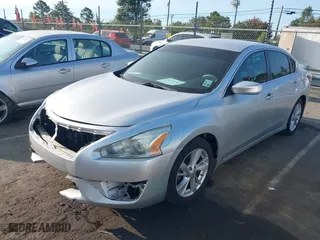 2015 Nissan Altima 2.5 SV with VIN 1N4AL3AP9FC450963, listed as a IAAI auction lot 40270304 with 125,603 mi miles. Bid and sale history available at carsss.com. Image 2.