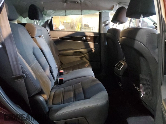 2019 Kia Sorento LX z VIN 5XYPG4A37KG575753, wystawiony jako Copart lot #44988355 z przebiegiem 55 933 mil mil oraz Szkoda całkowita • Salvage title. Historia ofert i sprzedaży dostępna na DreamBid. Obrazek 11.