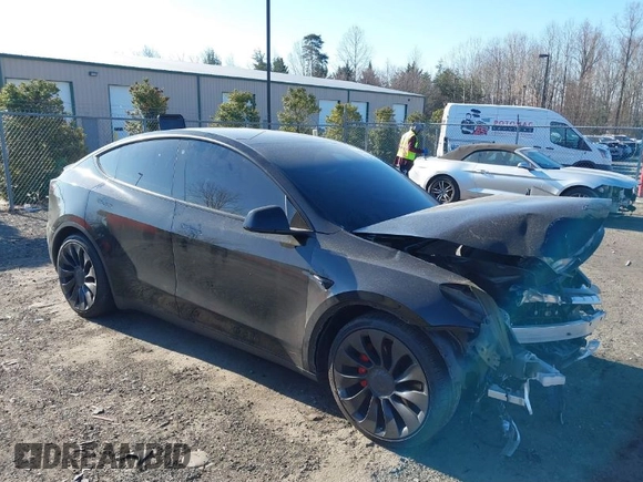 2022 Tesla Model Y Performance with VIN 7SAYGDEF0NF447460, listed as a IAAI auction lot 41670250 with 28,287 mi miles. Bid and sale history available at carsss.com. Image 1.