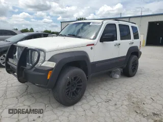 2010 Jeep Liberty Sport with VIN 1J4PN2GK2AW144063, listed as a Copart auction lot 58055585 with 132,580 mi miles and Salvage title. Bid and sale history available at DreamBid. Image 1.