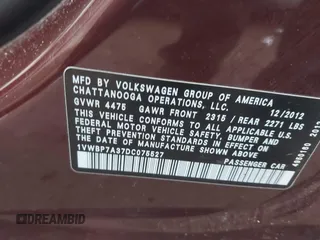 2013 Volkswagen Passat SE w/Sunroof & Nav with VIN 1VWBP7A37DC075527, listed as a IAAI auction lot 41055338 with 151,177 mi miles. Bid and sale history available at carsss.com. Image 9.
