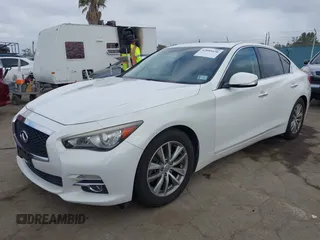2014 Infiniti Q50 Premium z VIN JN1BV7APXEM670656, wystawiony jako IAAI lot #42085636 z przebiegiem 88 147 mil mil oraz . Historia ofert i sprzedaży dostępna na DreamBid. Obrazek 2.