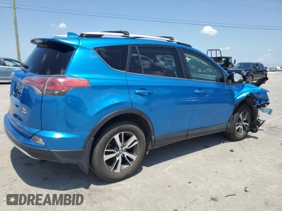 2016 Toyota RAV4 XLE with VIN JTMRFREV2GJ058808, listed as a Copart auction lot 61449135 with 73,985 mi miles and Salvage title. Bid and sale history available at DreamBid. Image 3.