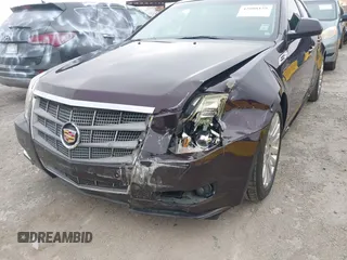 2010 Cadillac CTS Premium with VIN 1G6DP5EV4A0116188, listed as a IAAI auction lot 42808158 with 125,359 mi miles and . Bid and sale history available at DreamBid. Image 6.