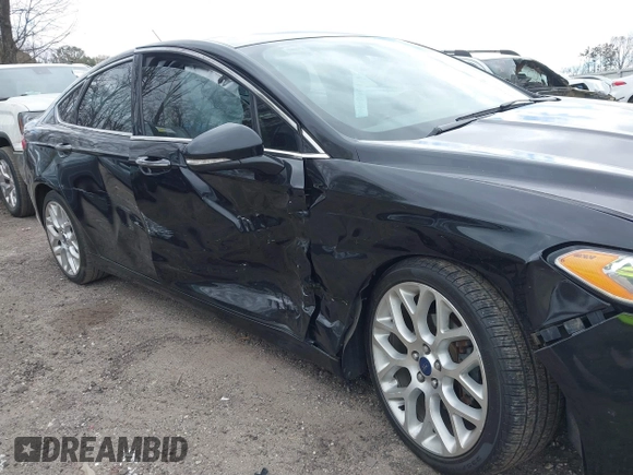 2014 Ford Fusion Titanium with VIN 3FA6P0K92ER355539, listed as a IAAI auction lot 41851471 with 178,176 mi miles and . Bid and sale history available at DreamBid. Image 6.