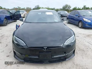 2023 Tesla Model S with VIN 5YJSA1E52PF500088, listed as a IAAI auction lot 41372918 with Not provided miles and . Bid and sale history available at DreamBid. Image 13.