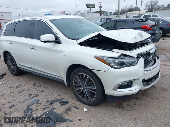 2020 Infiniti QX60 Pure with VIN 5N1DL0MN7LC545576, listed as a IAAI auction lot 41615817 with 62,858 mi miles and . Bid and sale history available at DreamBid. Image 1.