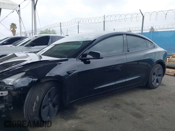 2023 Tesla Model 3 with VIN 5YJ3E1EA7PF473749, listed as a IAAI auction lot 41921478 with 21,483 mi miles and . Bid and sale history available at DreamBid. Image 13.