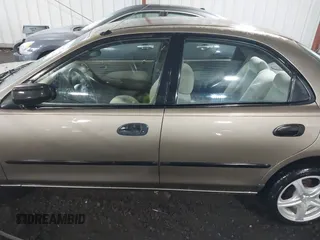 1998 Mazda Protege DX with VIN JM1BC141XW0200689, listed as a IAAI auction lot 41540162 with 172,311 mi miles and . Bid and sale history available at DreamBid. Image 14.