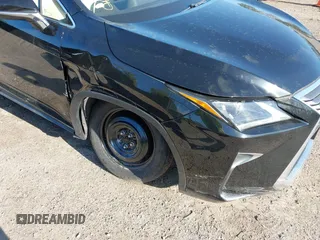 2019 Lexus RX with VIN 2T2BZMCA3KC193615, listed as a IAAI auction lot 42097232 with 33,797 mi miles. Bid and sale history available at carsss.com. Image 6.