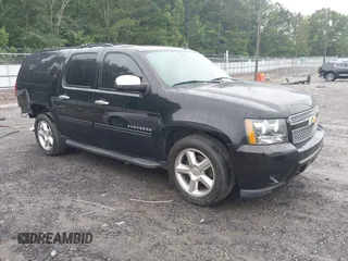 2012 Chevrolet Suburban LS with VIN 1GNSCHE02CR305983, listed as a IAAI auction lot 42345911 with 115,155 mi miles and . Bid and sale history available at DreamBid. Image 1.