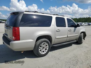 2007 GMC Yukon XL SLT z VIN 1GKFC16037R181233, wystawiony jako Copart lot #61639285 z przebiegiem 152 408 mil mil oraz Czysty tytuł • Clean title. Historia ofert i sprzedaży dostępna na DreamBid. Obrazek 3.