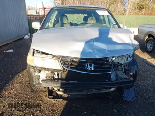 2002 Honda Odyssey EX z VIN 2HKRL18652H566576, wystawiony jako IAAI lot #40974704 z przebiegiem 232 172 mil mil oraz . Historia ofert i sprzedaży dostępna na DreamBid. Obrazek 6.