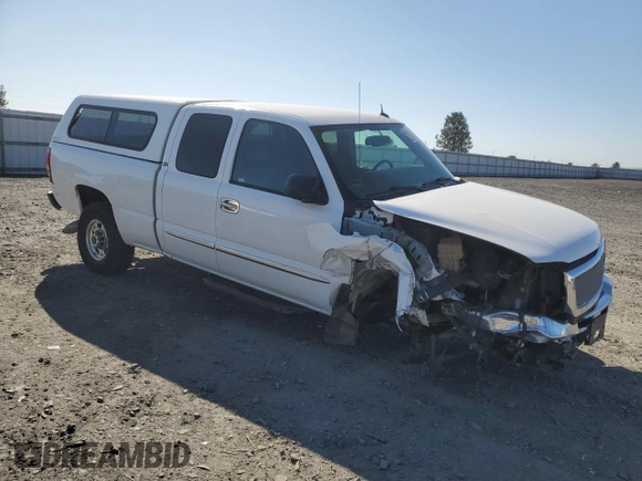 2005 GMC Sierra 1500 with VIN 1GTHC29215E161722, listed as a Copart auction lot 53283965 with 112,857 mi miles and Salvage Title. Bid and sale history available at DreamBid. Image 4.