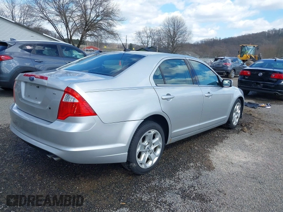 2011 Ford Fusion SE with VIN 3FAHP0HA8BR273529, listed as a IAAI auction lot 41890616 with 85,486 mi miles. Bid and sale history available at carsss.com. Image 4.