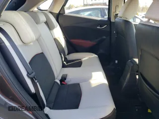 2016 Mazda CX-3 Grand Touring z VIN JM1DKBD7XG0107274, wystawiony jako Copart lot #52137385 z przebiegiem 35 376 mil mil oraz Szkoda całkowita • Salvage title. Historia ofert i sprzedaży dostępna na DreamBid. Obrazek 10.