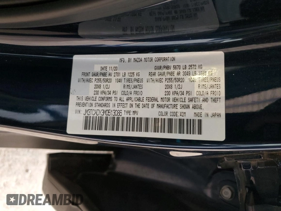 2021 Mazda CX-9 Carbon Edition z VIN JM3TCADY3M0513086, wystawiony jako Copart lot #53734925 z przebiegiem 92 744 mil mil oraz Szkoda całkowita • Salvage title. Historia ofert i sprzedaży dostępna na DreamBid. Obrazek 13.