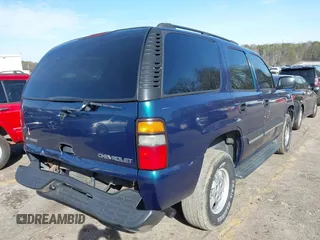 2005 Chevrolet Tahoe LT z VIN 1GNEC13T25R131448, wystawiony jako IAAI lot #41748373 z przebiegiem 270 659 mil mil oraz . Historia ofert i sprzedaży dostępna na DreamBid. Obrazek 4.
