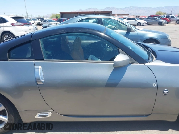 2004 Nissan 350Z Enthusiast z VIN JN1AZ34D74T164233, wystawiony jako IAAI lot #42509421 z przebiegiem 90 780 mil mil oraz . Historia ofert i sprzedaży dostępna na DreamBid. Obrazek 14.