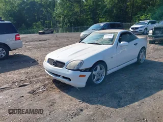 1999 Mercedes-Benz SLK-Class with VIN WDBKK47F1XF086364, listed as a IAAI auction lot 42124466 with 177,104 mi miles. Bid and sale history available at carsss.com. Image 2.
