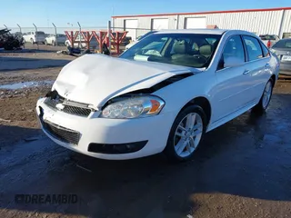 2014 Chevrolet Impala LTZ with VIN 2G1WC5E31E1157669, listed as a IAAI auction lot 41429789 with 122,239 mi miles and . Bid and sale history available at DreamBid. Image 17.