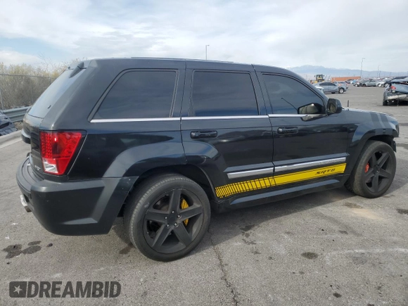2008 Jeep Grand Cherokee SRT-8 with VIN 1J8HR78398C214004, listed as a Copart auction lot 48760375 with 165,318 mi miles and Salvage Title. Bid and sale history available at carsss.com. Image 3.