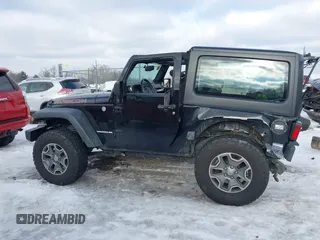 2013 Jeep Wrangler Rubicon 10th Anniversary with VIN 1C4BJWCG3DL591186, listed as a IAAI auction lot 41315969 with 54,984 mi miles and . Bid and sale history available at DreamBid. Image 15.