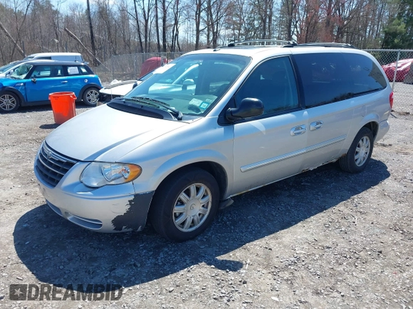 2006 Chrysler Town & Country LWB Touring with VIN 2A4GP54LX6R844499, listed as a IAAI auction lot 42082846 with 133,091 mi miles. Bid and sale history available at carsss.com. Image 2.