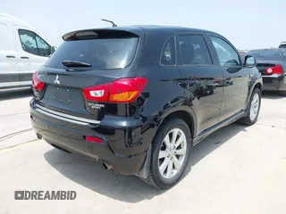 2012 Mitsubishi Outlander SE with VIN JA4AP4AU1CZ002844, listed as a IAAI auction lot 42297590 with 66,065 mi miles and . Bid and sale history available at DreamBid. Image 4.