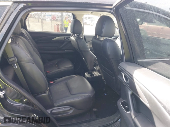 2023 Mazda CX-9 Touring Plus with VIN JM3TCBAY9P0649348, listed as a IAAI auction lot 41519499 with 23,749 mi miles and . Bid and sale history available at DreamBid. Image 8.