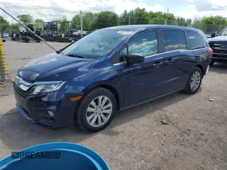 2019 Honda Odyssey LX with VIN 5FNRL6H28KB027071, listed as a Copart auction lot 54882995 with 87,988 mi miles and Salvage Title. Bid and sale history available at DreamBid. Image 1.