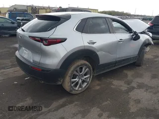 2021 Mazda CX-30 Preferred with VIN 3MVDMBCL6MM240663, listed as a IAAI auction lot 42165803 with 52,262 mi miles and . Bid and sale history available at DreamBid. Image 4.