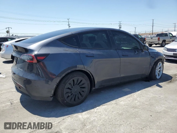 2024 Tesla Model Y Long Range with VIN 7SAYGDEE6RA226035, listed as a Copart auction lot 52539375 with 14,220 mi miles and Salvage title. Bid and sale history available at DreamBid. Image 3.