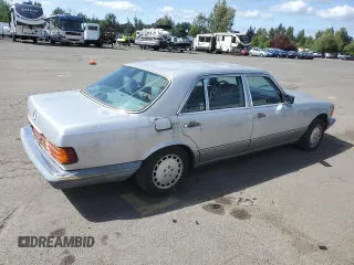 1986 Mercedes-Benz 560 z VIN WDBCA39D0GA245644, wystawiony jako Copart lot #56563485 z przebiegiem 231 797 mil mil oraz Tytuł czysty. Historia ofert i sprzedaży dostępna na DreamBid. Obrazek 3.