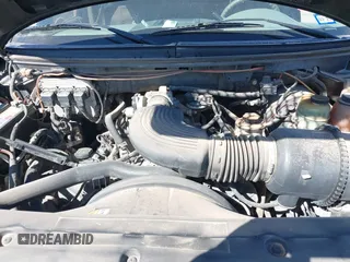 2005 Ford F-150 XLT with VIN 1FTRW12W85KC74796, listed as a IAAI auction lot 41761901 with 235,009 mi miles. Bid and sale history available at carsss.com. Image 10.