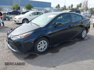2022 Toyota Prius L Eco with VIN JTDKAMFU2N3157283, listed as a IAAI auction lot 41620334 with 59,754 mi miles and . Bid and sale history available at DreamBid. Image 16.
