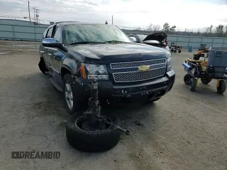 2012 Chevrolet Tahoe LTZ with VIN 1GNSKCE08CR322969, listed as a Copart auction lot 50604555 with 165,190 mi miles and Salvage title. Bid and sale history available at DreamBid. Image 12.
