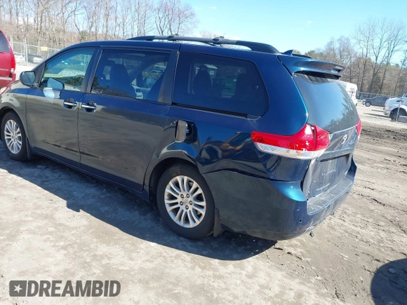 2011 Toyota Sienna XLE AAS with VIN 5TDYK3DCXBS114882, listed as a IAAI auction lot 42007417 with 144,087 mi miles and . Bid and sale history available at DreamBid. Image 3.