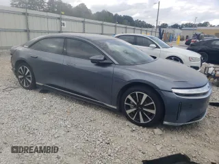 2023 Lucid Air Pure z VIN 50EA1PFA0PA006360, wystawiony jako Copart lot #72276924 z przebiegiem 4982 mil mil oraz Tytuł czysty. Historia ofert i sprzedaży dostępna na DreamBid. Obrazek 4.