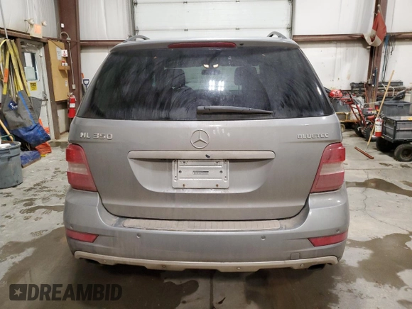 2010 Mercedes-Benz M 350 with VIN 4JGBB2FBXAA569999, listed as a Copart auction lot 84637134 with 254,712 mi miles and Clean Title. Bid and sale history available at DreamBid. Image 6.