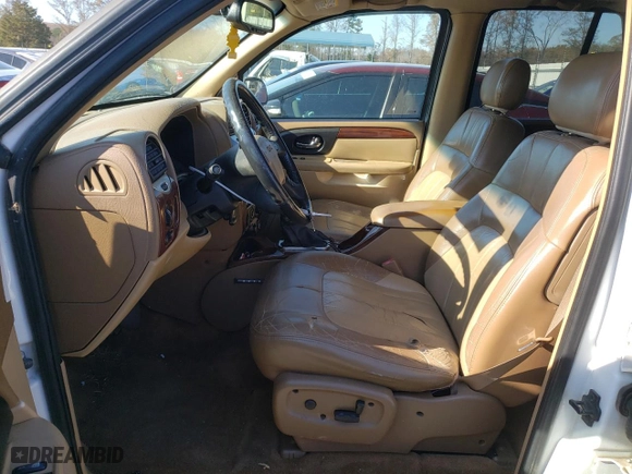 2003 GMC Envoy SLE with VIN 1GKDS13SX32242421, listed as a Copart auction lot 82654814 with 0 mi miles and Salvage Title. Bid and sale history available at carsss.com. Image 7.