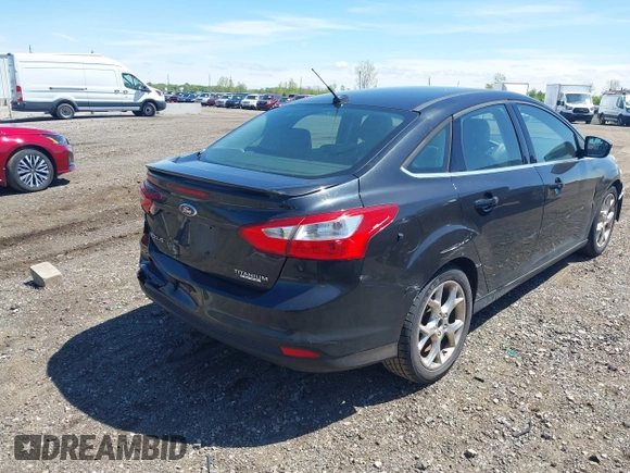 2013 Ford Focus Titanium with VIN 1FADP3J22DL106166, listed as a IAAI auction lot 42233351 with 108,300 mi miles and . Bid and sale history available at carsss.com. Image 4.