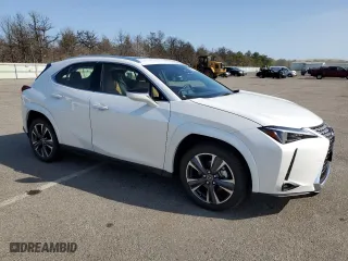 2025 Lexus UX with VIN JTHUCJDH6S2007491, listed as a Copart auction lot 52997175 with 1,042 mi miles and Salvage Title. Bid and sale history available at carsss.com. Image 4.