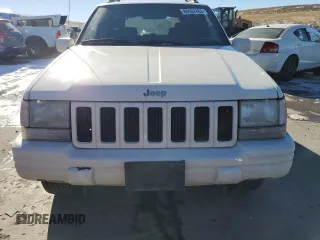 1998 Jeep Grand Cherokee Limited with VIN 1J4GZ88Z9WC180182, listed as a Copart auction lot 88602465 with 266,008 mi miles and Clean Title. Bid and sale history available at carsss.com. Image 5.